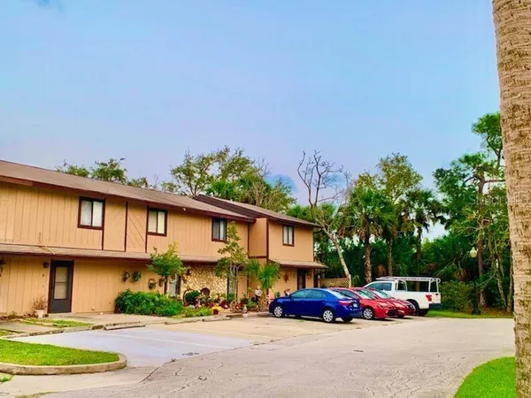 a car parked in front of a house