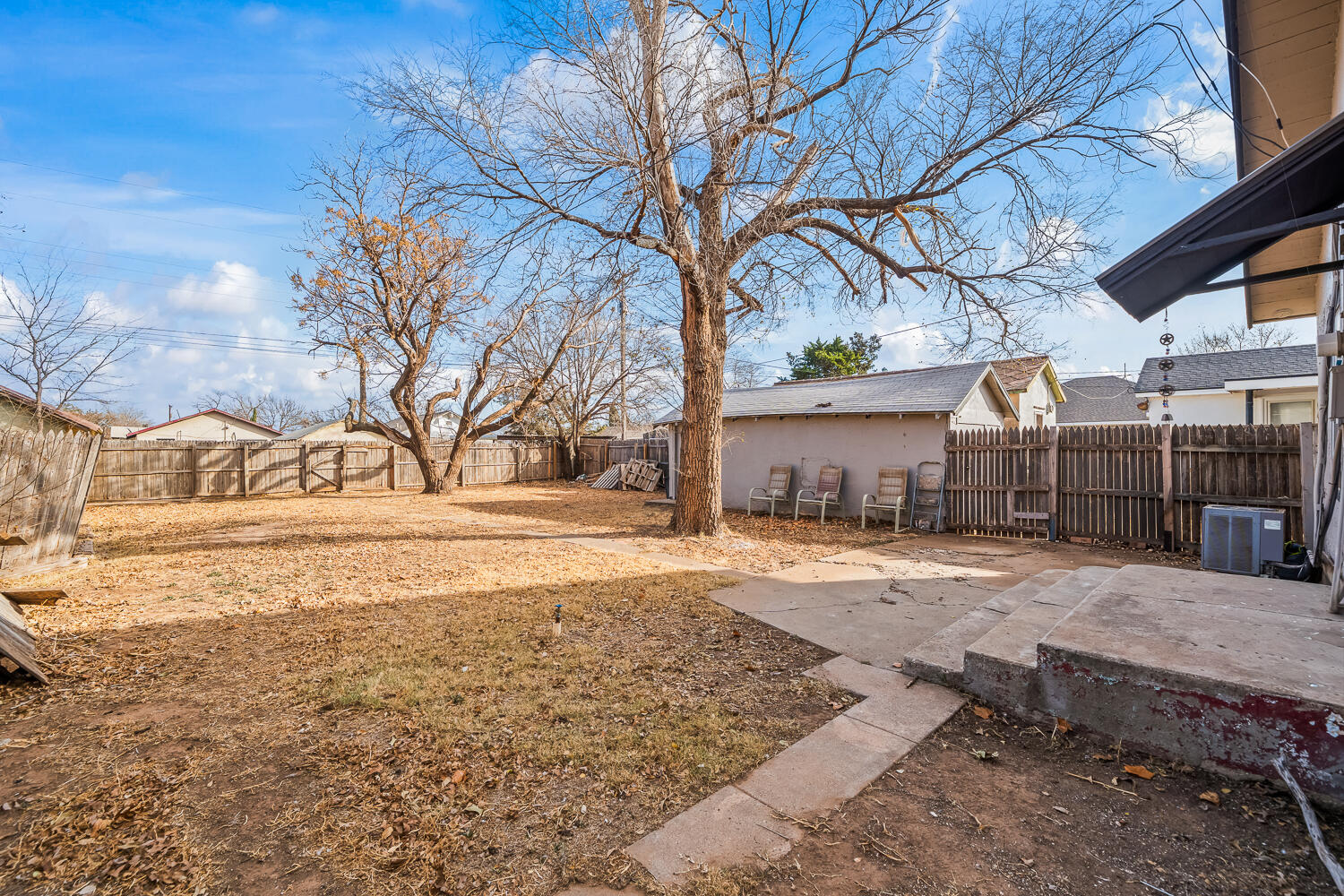 620 South 11th Street Slaton, TX 79364 - Photo 21 of 22 a view of a yard with snow on the road