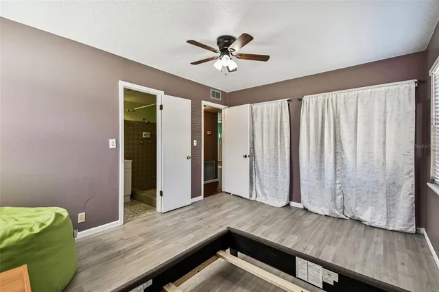 a view of room with ceiling fan
