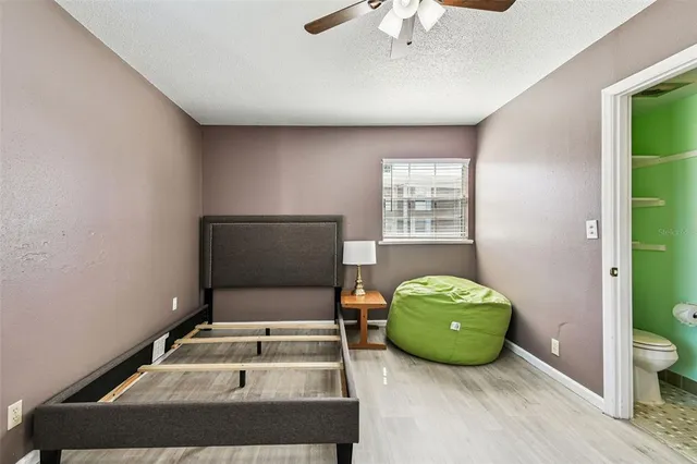 a room with furniture and a flat screen tv