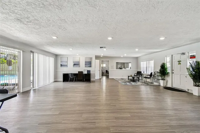 an outdoor space with potted plants