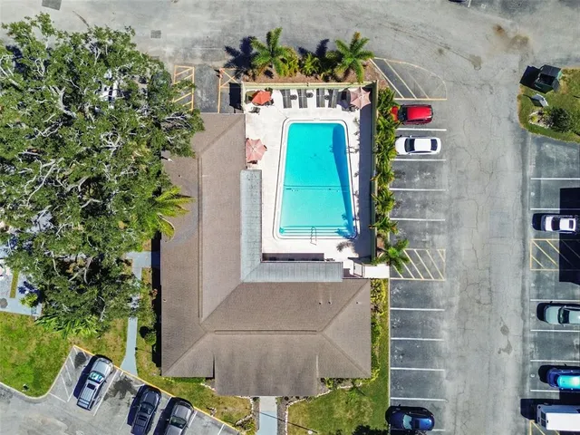 an aerial view of a dining room with furniture