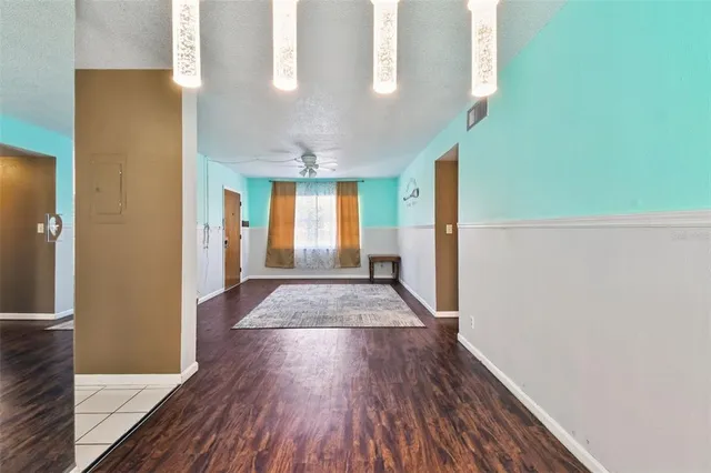 a view of gallery with wooden floor