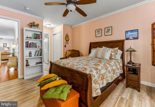 a bedroom with a bed and closet