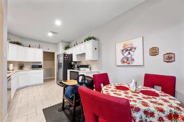 a bedroom with furniture and a bed