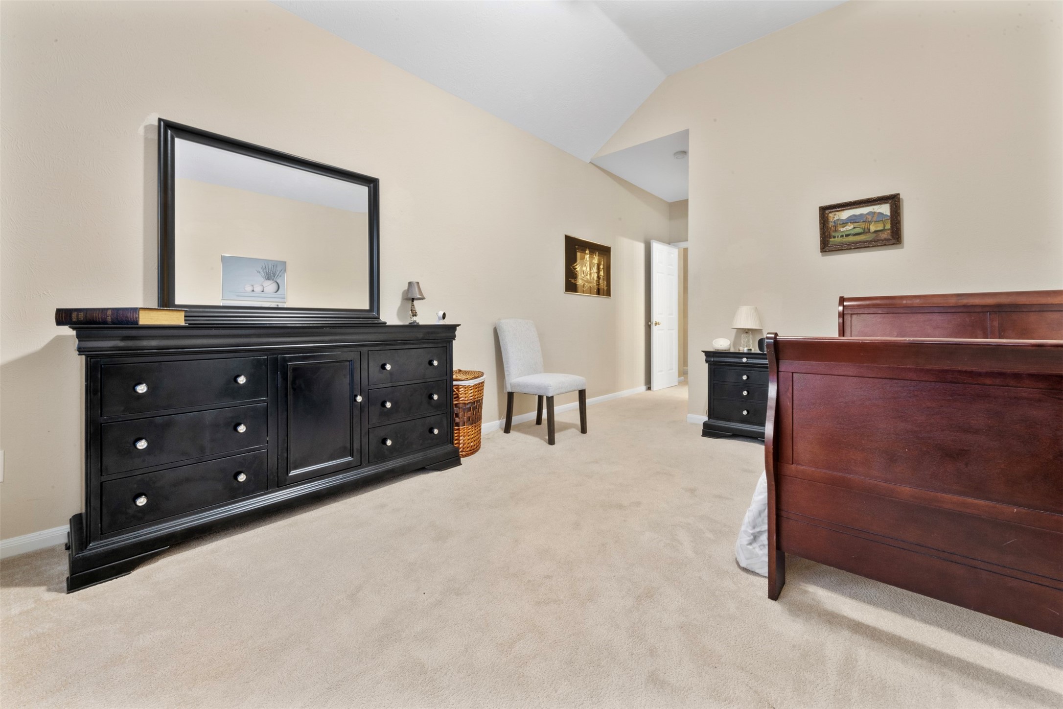 2334 Everest Way Houston, TX 77339 - Photo 22 of 29 a room with a bed and a mirror