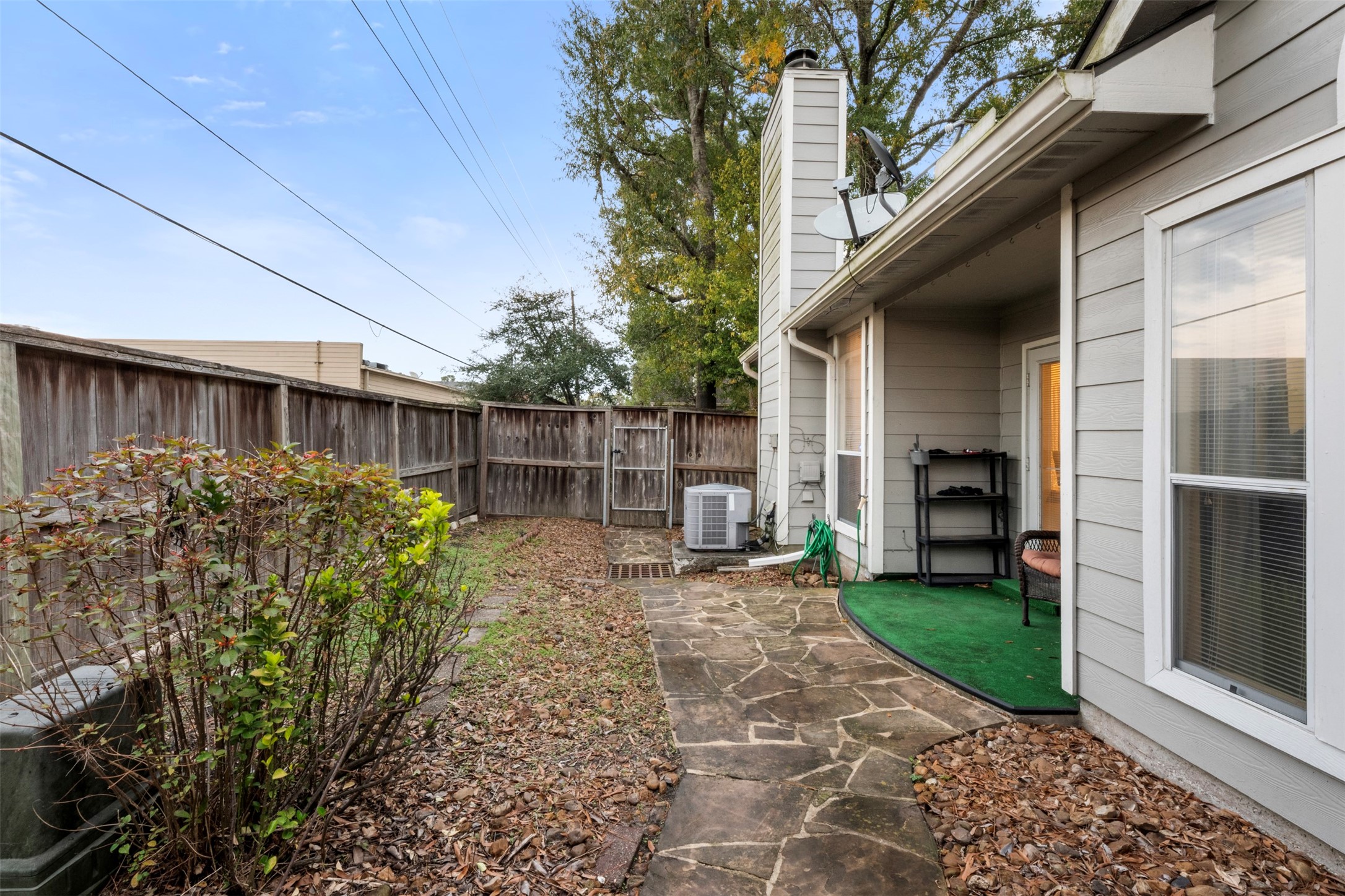 2334 Everest Way Houston, TX 77339 - Photo 23 of 29 a view of a backyard with plants and outdoor seating