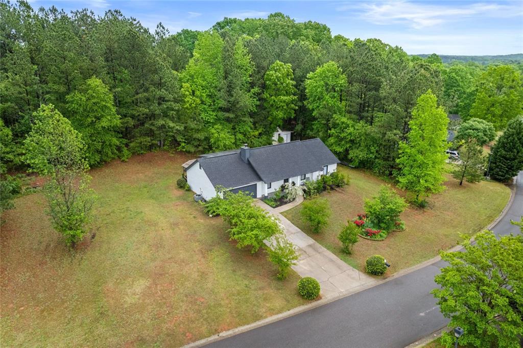 415 Southridge Road Winder, GA 30680 - Photo 1 of 1 an aerial view of a house with a yard