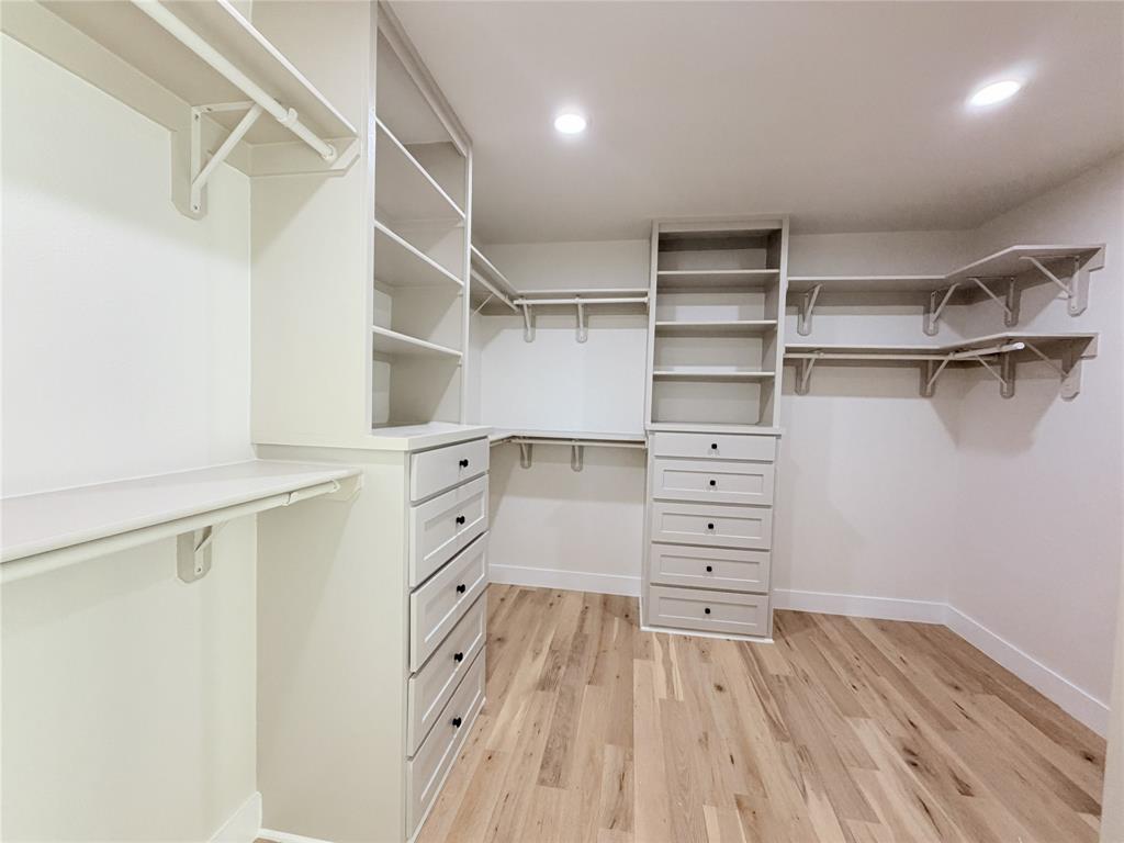 2780 Patrick Road Waxahachie, TX 75167 - Photo 13 of 20 a view of walk in closet with empty racks