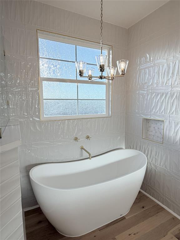 2780 Patrick Road Waxahachie, TX 75167 - Photo 8 of 20 a white bath tub sitting in a bathroom
