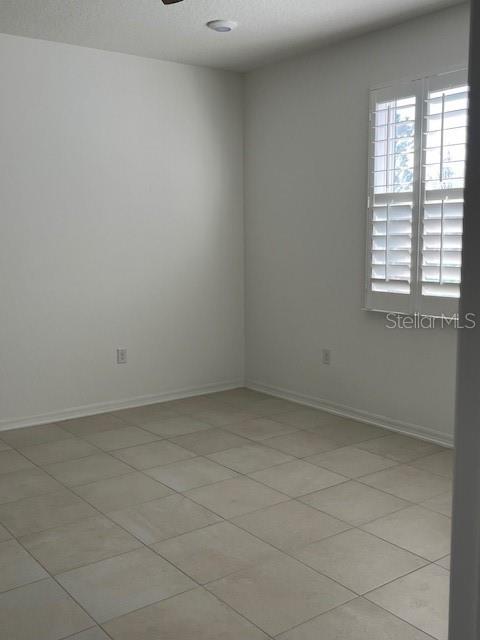 10584 Southwest 91st Street Road Ocala, FL 34481 - Photo 13 of 20 an empty room with a window
