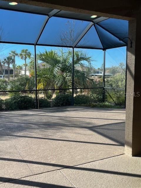 10584 Southwest 91st Street Road Ocala, FL 34481 - Photo 18 of 20 a view of a floor to ceiling window and an umbrella