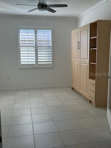 a kitchen with a refrigerator and window