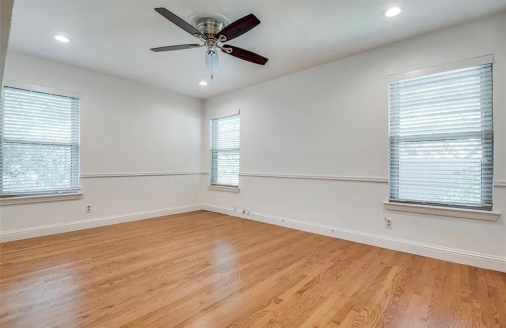 13038 Copenhill Road Dallas, TX 75240 - Photo 11 of 15 Wood-finish flooring, recessed lighting, ceiling fan, and multiple windows with blinds