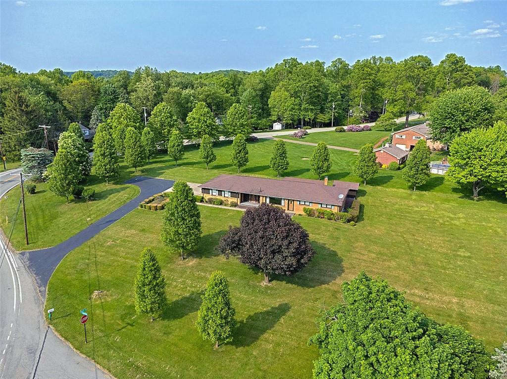 1702 Ridge Road Jeannette, PA 15644 - Photo 35 of 36 an aerial view of a house with a garden
