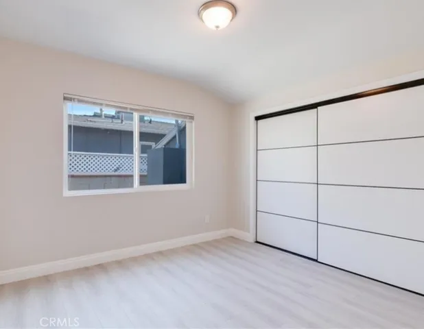 an empty room with a empty space and window