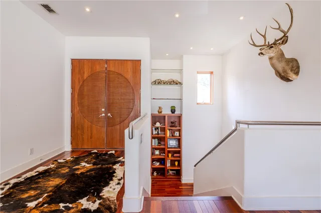 a view of entryway with wooden floor