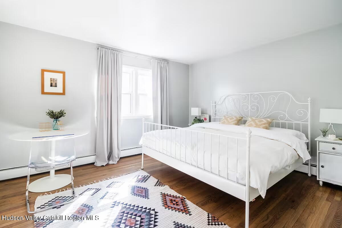 11 Shultis Farm Road Woodstock, NY 12409 - Photo 12 of 23 a bedroom with a bed and a window