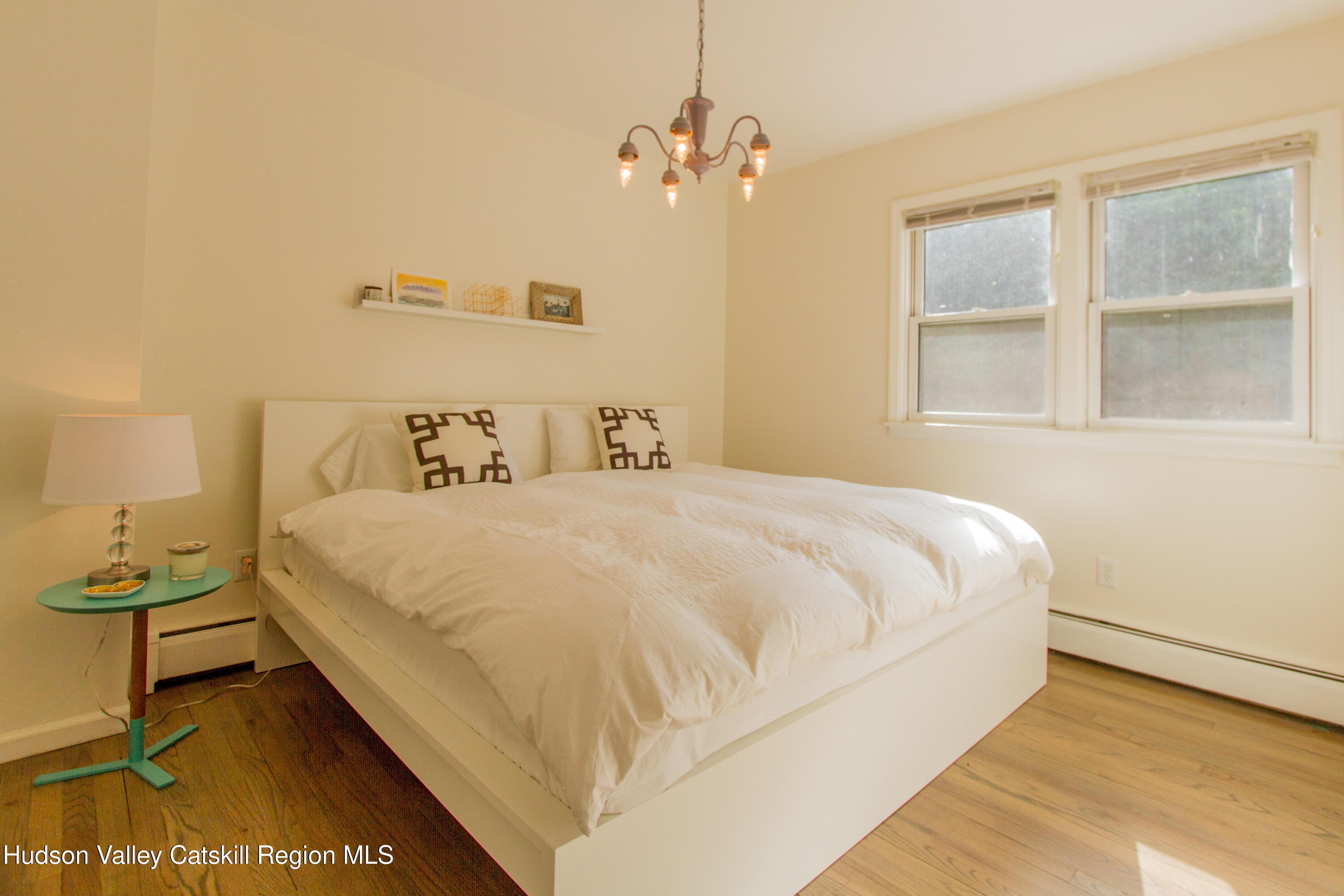 11 Shultis Farm Road Woodstock, NY 12409 - Photo 15 of 23 a bedroom with a bed and window