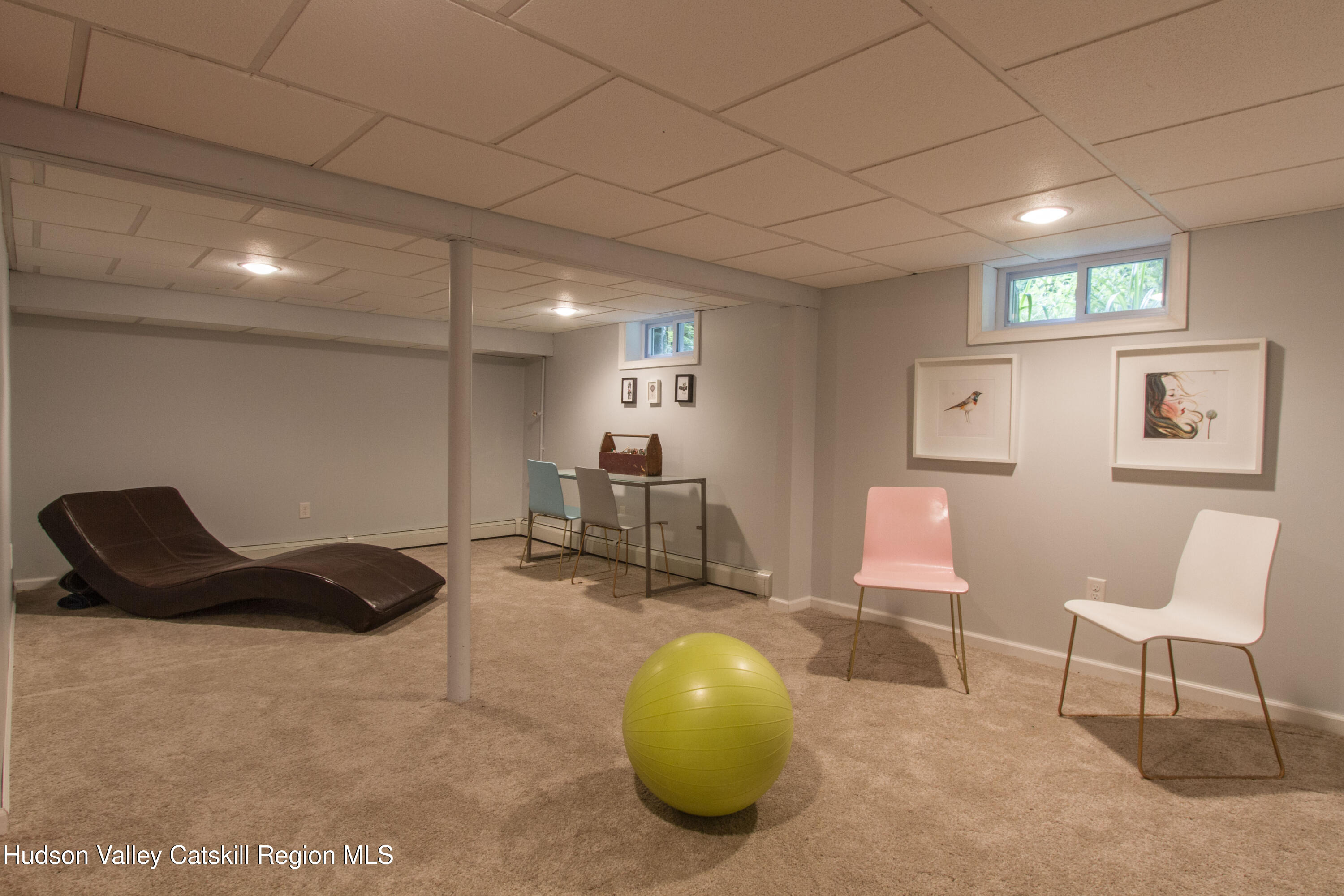 11 Shultis Farm Road Woodstock, NY 12409 - Photo 17 of 23 a room with furniture and a chair