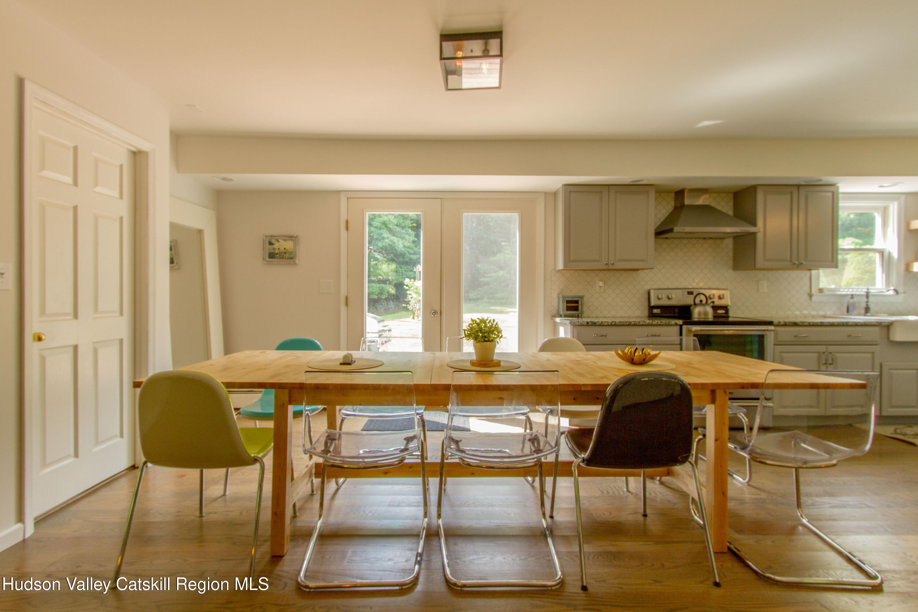 11 Shultis Farm Road Woodstock, NY 12409 - Photo 19 of 23 a living room with a couch and a table with wooden floor