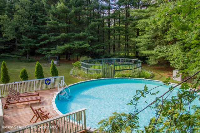 a view of a jacuzzi with a small yard