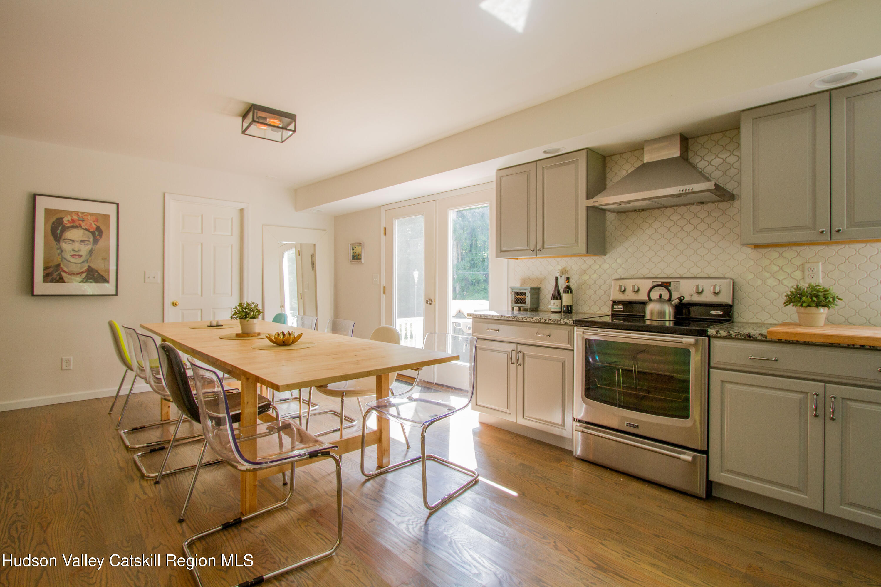 11 Shultis Farm Road Woodstock, NY 12409 - Photo 3 of 23 a kitchen with stainless steel appliances a stove a sink and a refrigerator