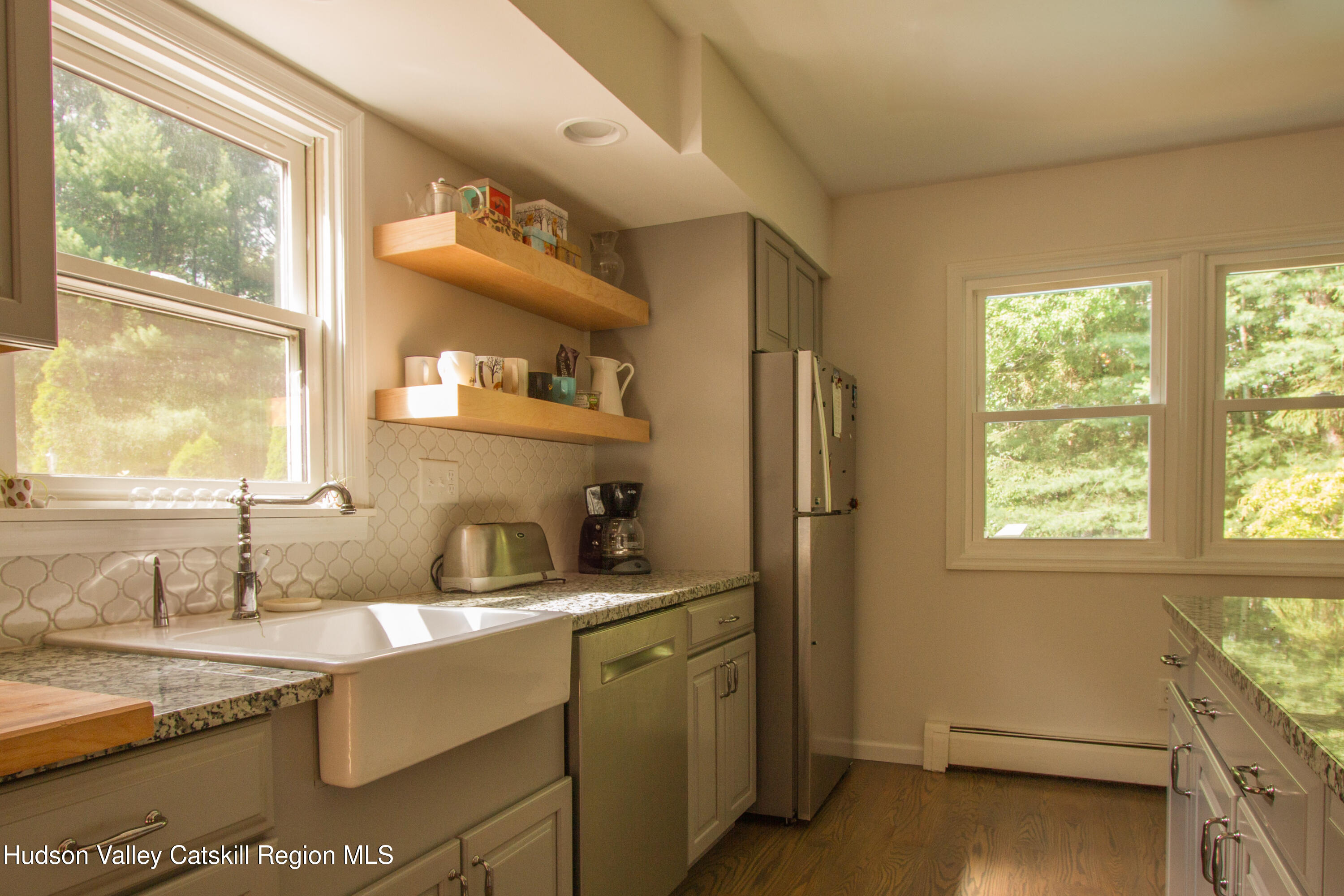 11 Shultis Farm Road Woodstock, NY 12409 - Photo 5 of 23 a bathroom with a sink and a window