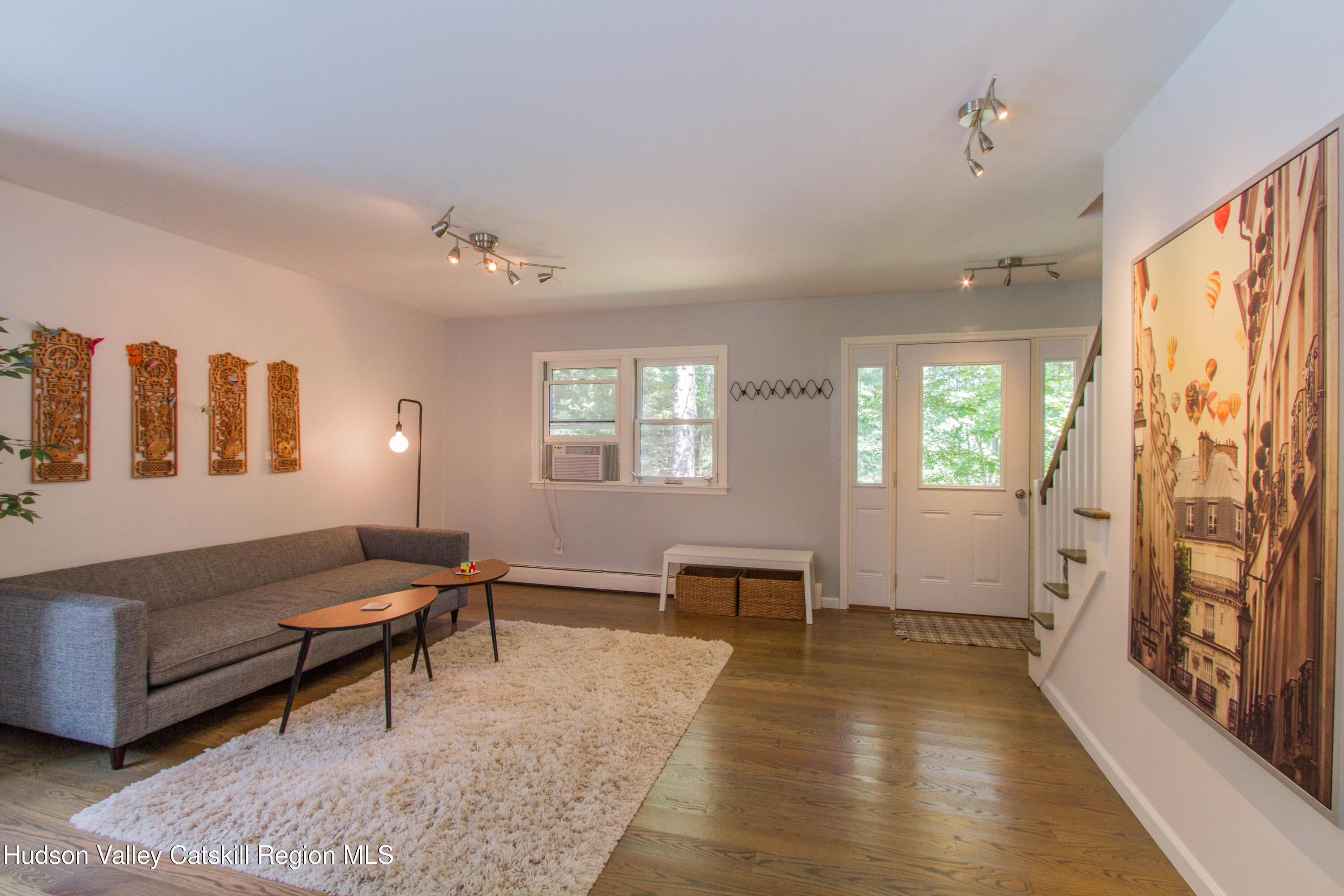 11 Shultis Farm Road Woodstock, NY 12409 - Photo 9 of 23 a living room with furniture and a window