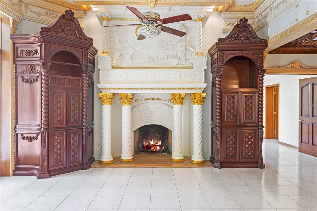 1577 Alexander Road Belleair, FL 33756 - Photo 11 of 65 a view of a fireplace with entryway and a fireplace