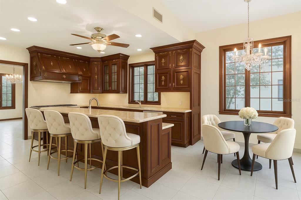 1577 Alexander Road Belleair, FL 33756 - Photo 20 of 65 a dining room with furniture and window