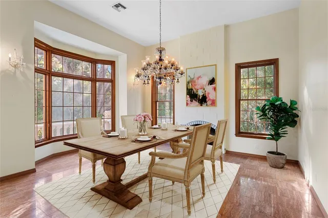 a kitchen with granite countertop a sink and cabinets
