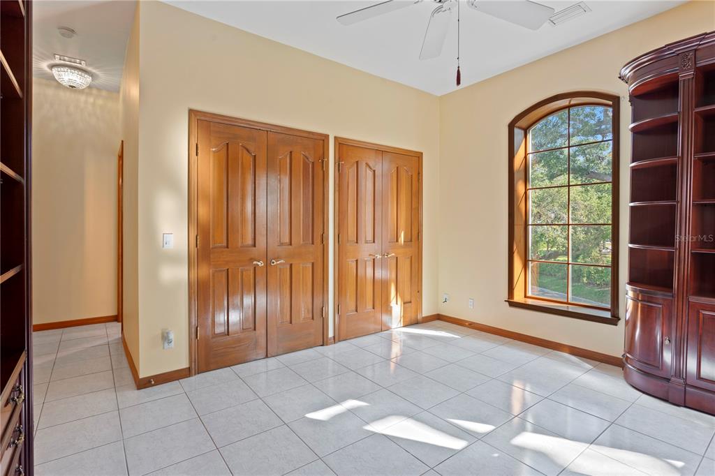 1577 Alexander Road Belleair, FL 33756 - Photo 50 of 65 a view of an entryway with a window and front door