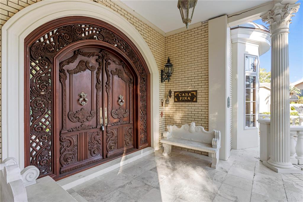 1577 Alexander Road Belleair, FL 33756 - Photo 5 of 65 a view of entrance door of a house