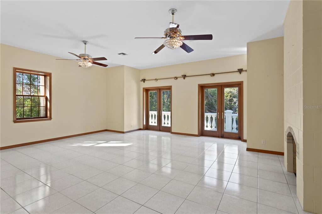 1577 Alexander Road Belleair, FL 33756 - Photo 52 of 65 a view of an empty room with a window