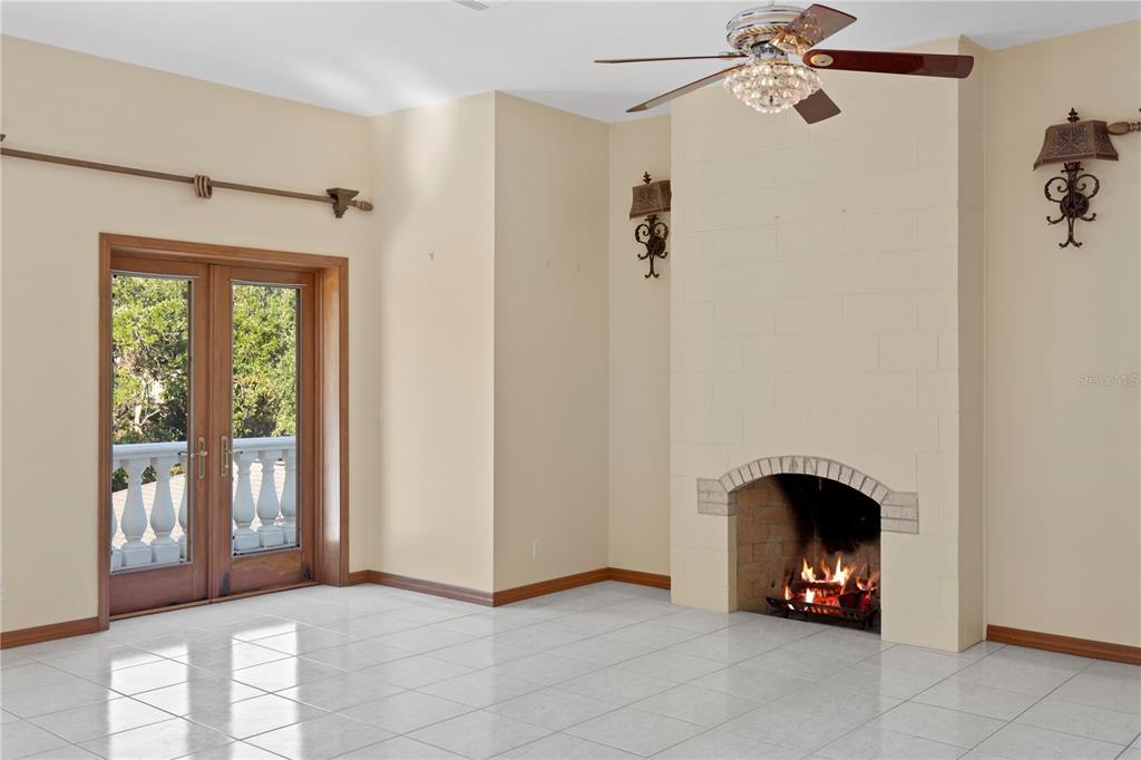 1577 Alexander Road Belleair, FL 33756 - Photo 56 of 65 a view of an entryway with a fireplace