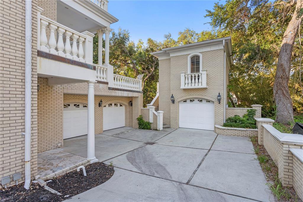1577 Alexander Road Belleair, FL 33756 - Photo 7 of 65 a view of a house with a yard