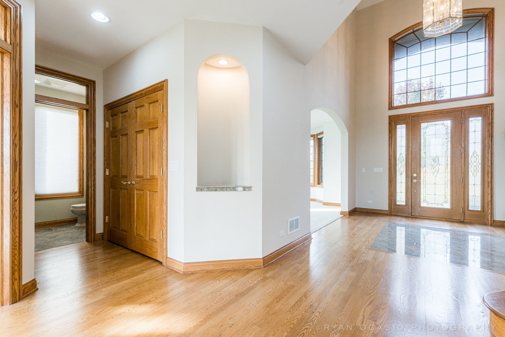 23374 West Milton Road Wauconda, IL 60084 - Photo 15 of 49 an empty room with wooden floor and a bathroom