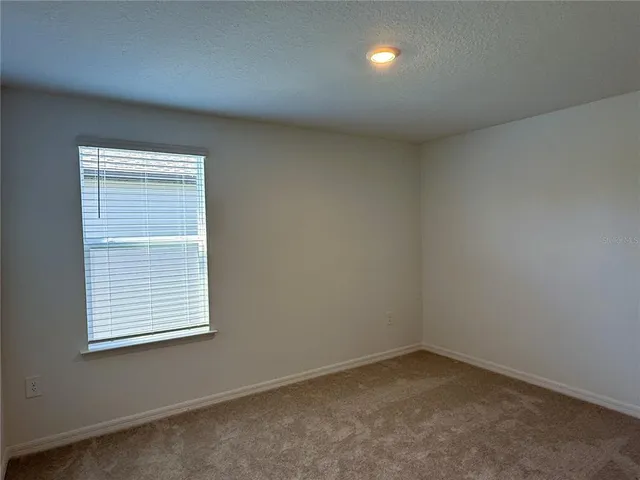 a view of room with closet area