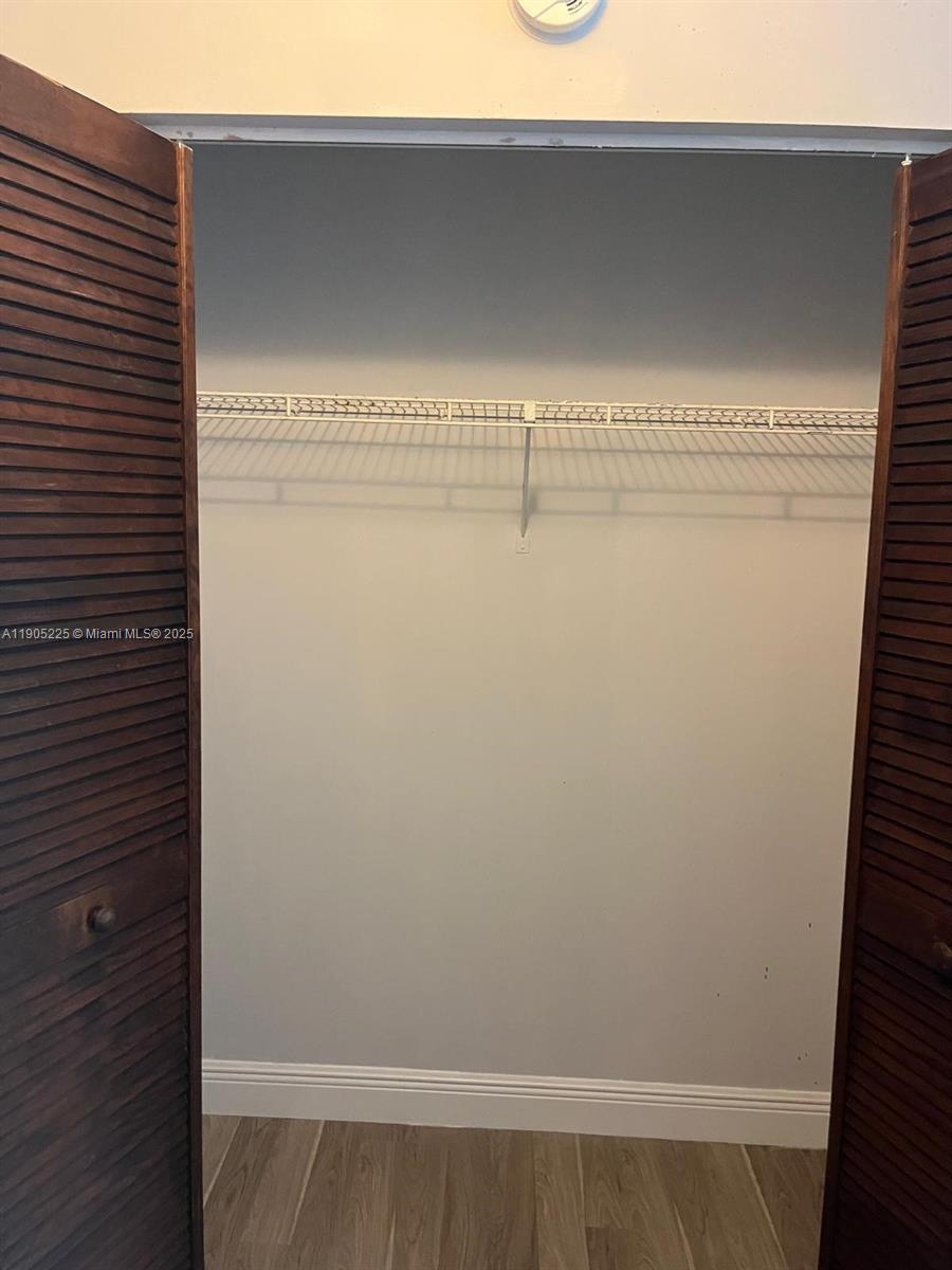 2701 Riverside Drive, Unit 203B Coral Springs, FL 33065 - Photo 12 of 18 a view of a closet