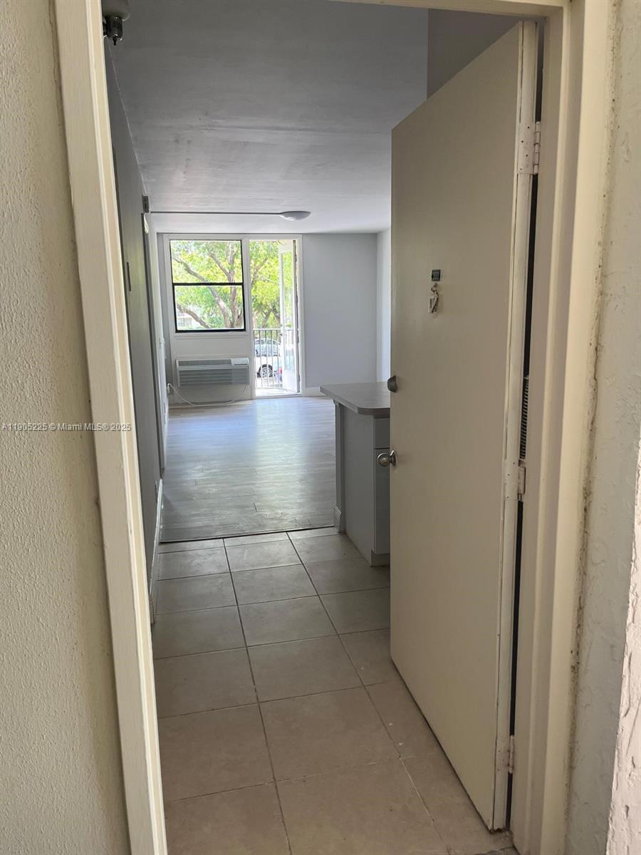 2701 Riverside Drive, Unit 203B Coral Springs, FL 33065 - Photo 2 of 18 a view of a hallway and closet area