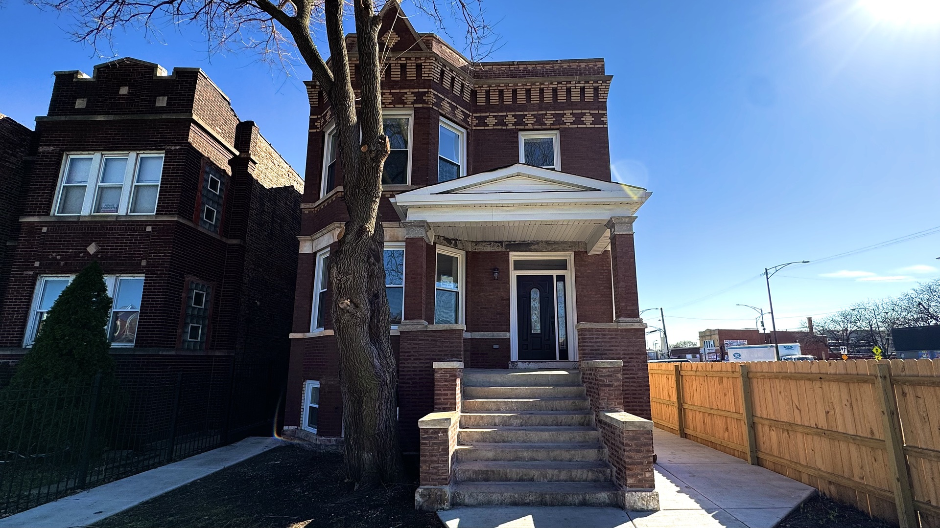 4751 West Monroe Street Chicago, IL 60644 - Photo 1 of 22 a view of a building with sitting area