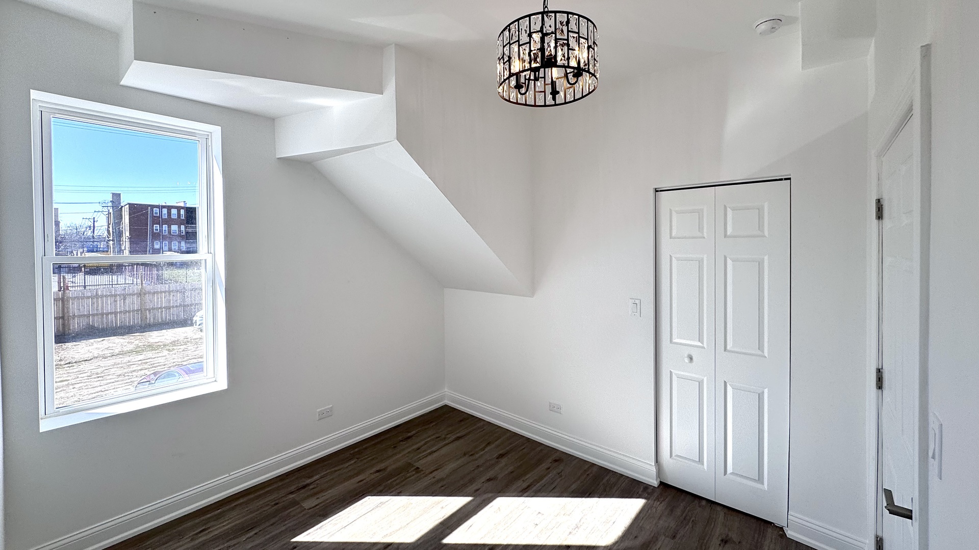 4751 West Monroe Street Chicago, IL 60644 - Photo 11 of 22 a view of an entryway with a window
