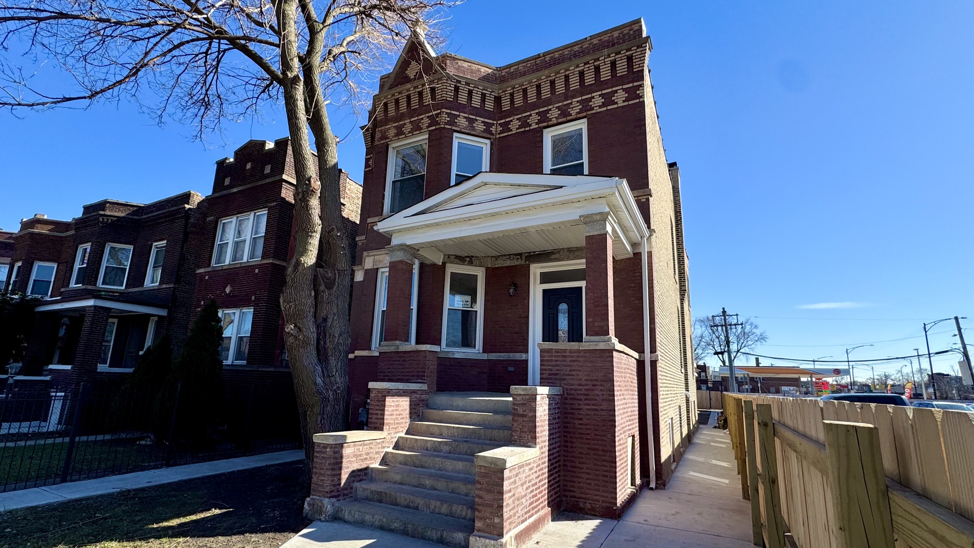 4751 West Monroe Street Chicago, IL 60644 - Photo 2 of 22 a view of a building with a porch