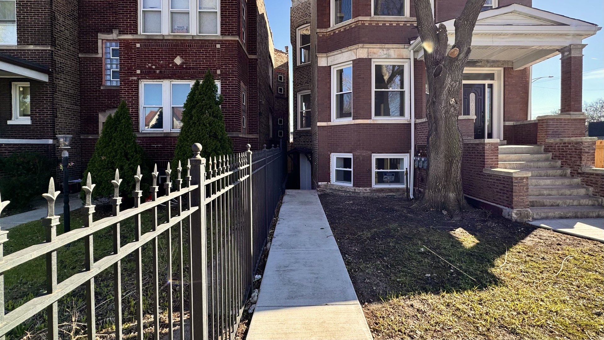 4751 West Monroe Street Chicago, IL 60644 - Photo 4 of 22 a view of a brick building with many windows