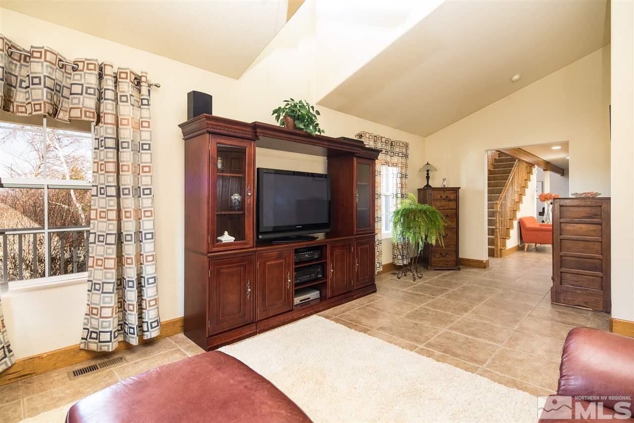 100 Boron Lane Reno, NV 89506 - Photo 12 of 25 a living room with furniture and a flat screen tv