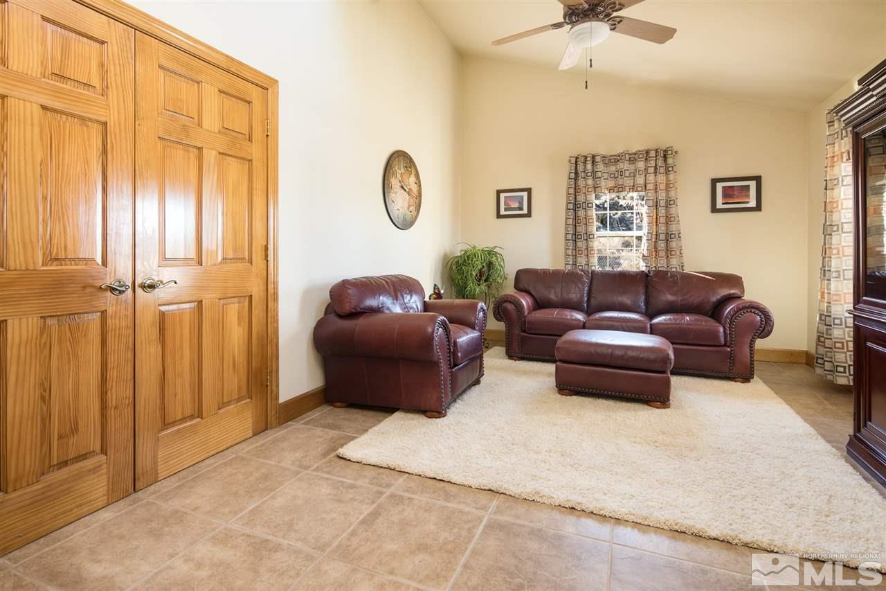 100 Boron Lane Reno, NV 89506 - Photo 13 of 25 a living room with furniture and a window