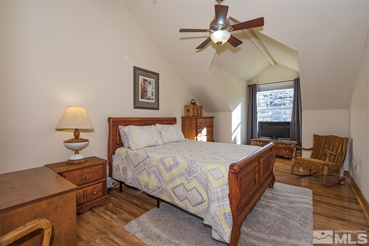 100 Boron Lane Reno, NV 89506 - Photo 14 of 25 a bedroom with bed and window