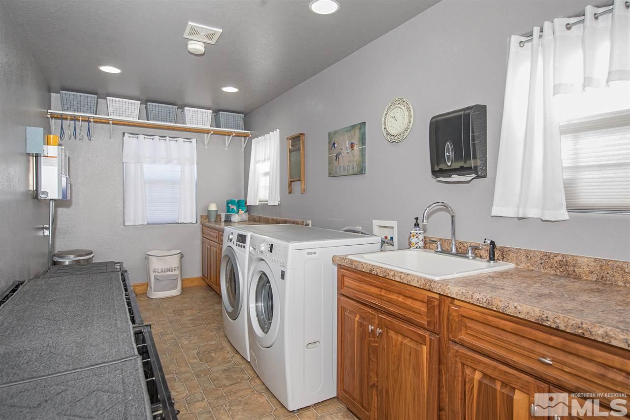 100 Boron Lane Reno, NV 89506 - Photo 19 of 25 a utility room with sink dryer and washer