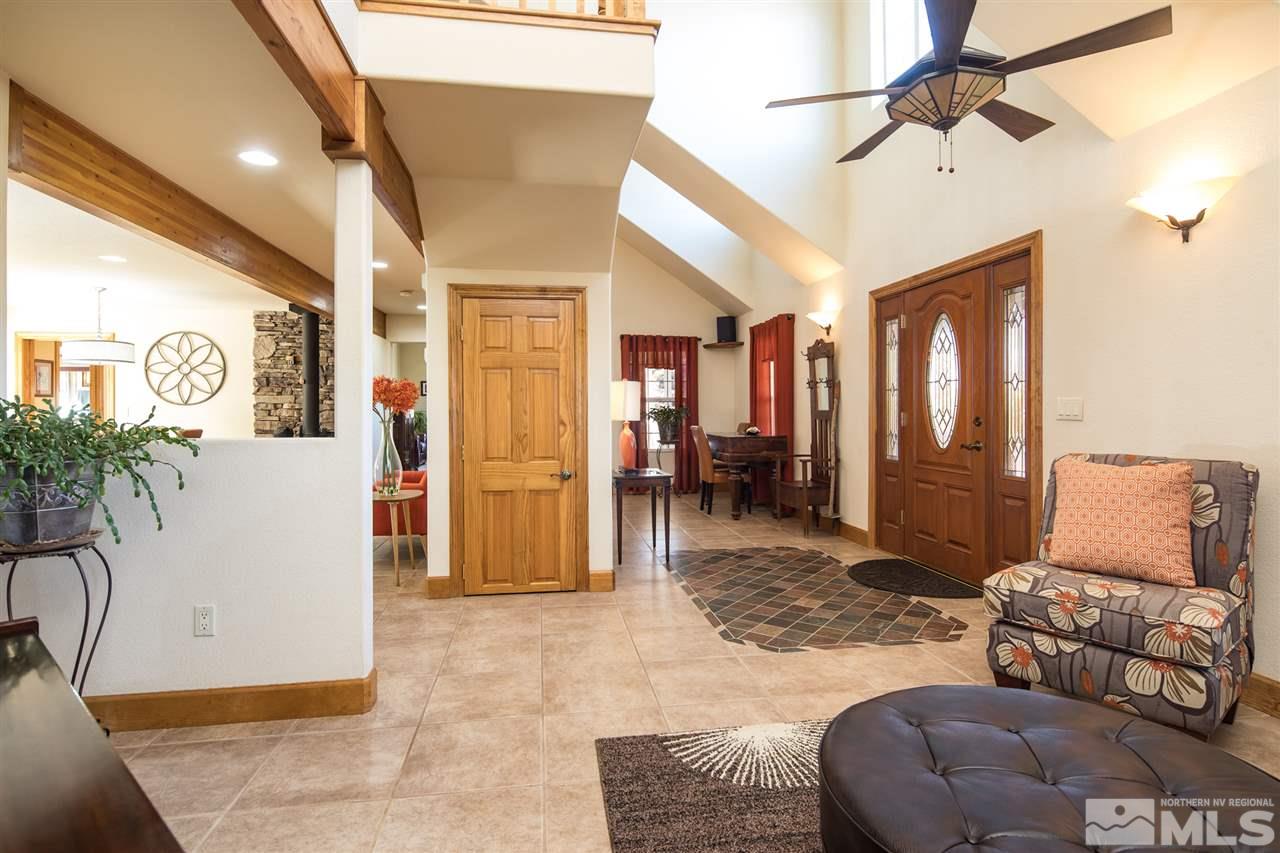 100 Boron Lane Reno, NV 89506 - Photo 2 of 25 a living room with furniture and wooden floor